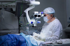 Eye surgeon is performing PRK LASIK surgery in the operating room